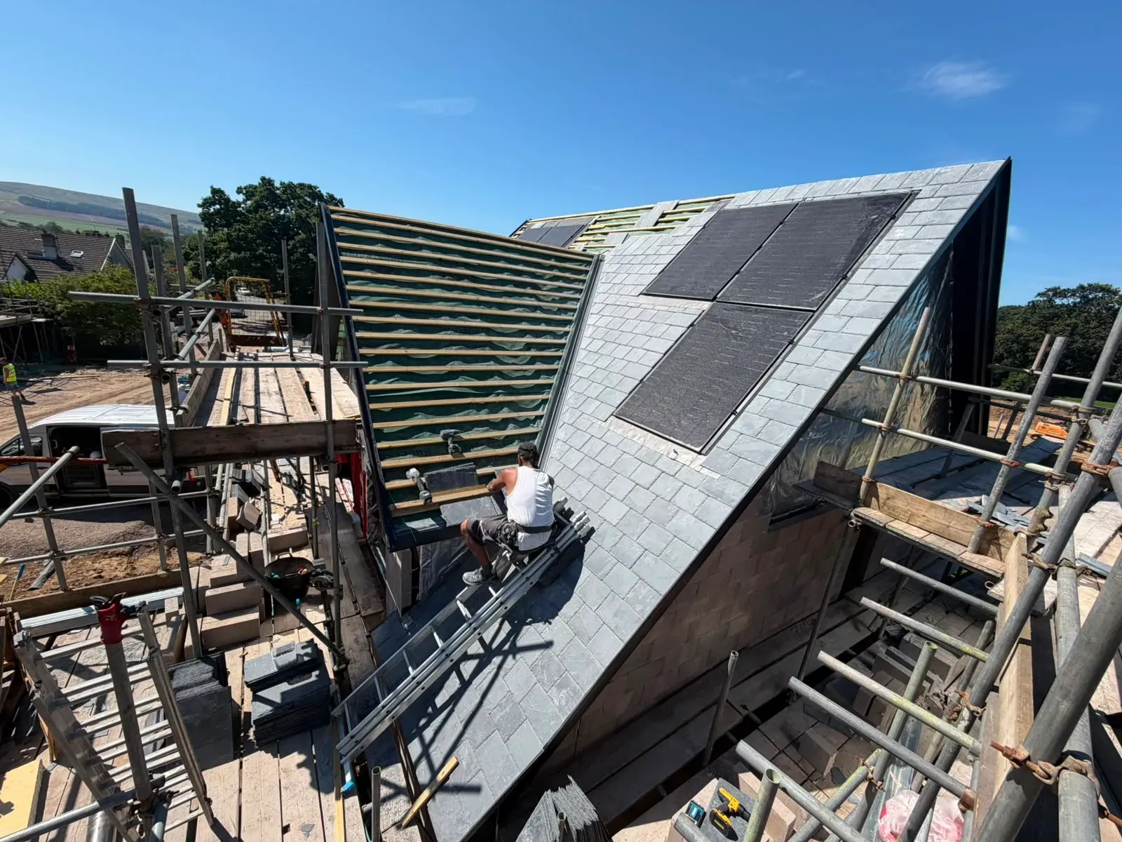Specialist pitched roof installation and natural slate slating work on a new roof in Worcester