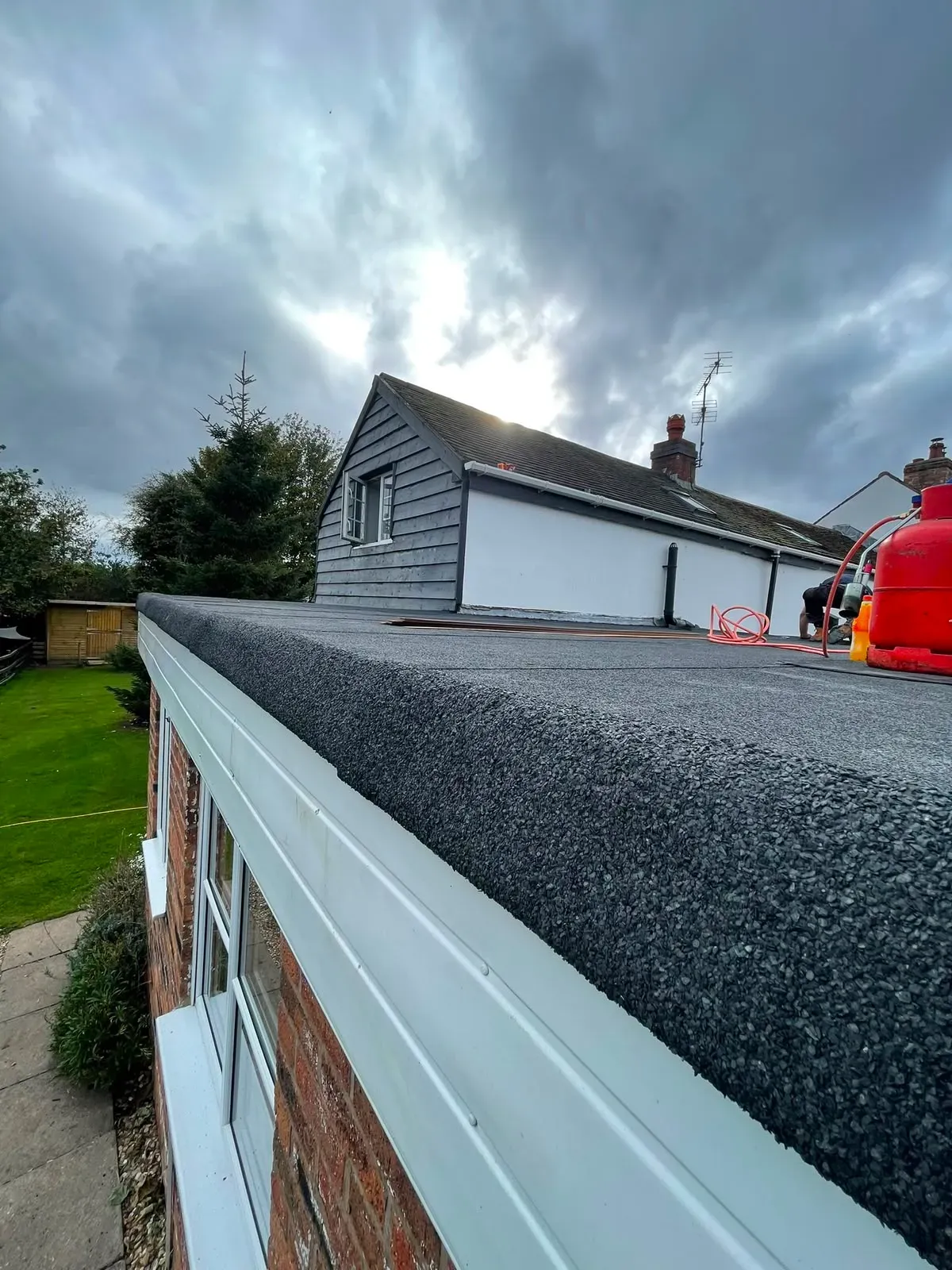 Torch-on mineral felt flat roof installation on a residential extension in Worcester