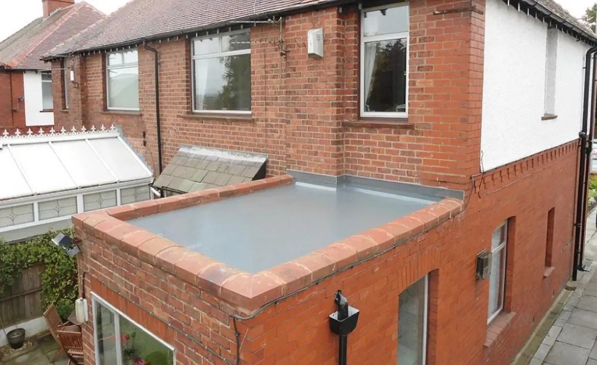 Seamless GRP fibreglass flat roof installation on a brick extension by STORMPROOF ROOFING & REPAIRS LTD