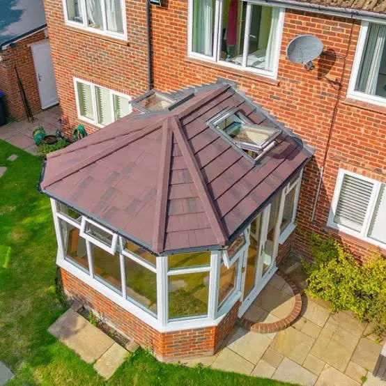 Insulated conservatory warm roof replacement with lightweight tiles and skylight in Worcester