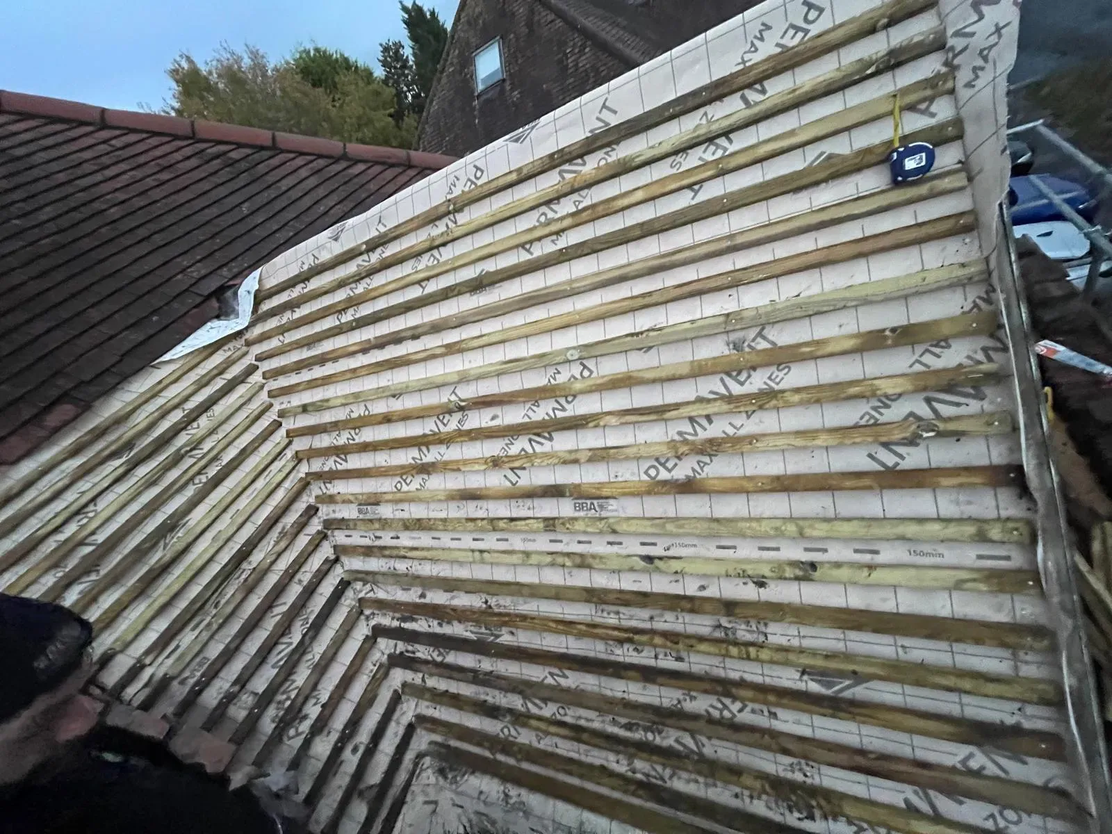 Pitched roof installation with breathable underlay and timber battens ready for tile fixing in Worcester