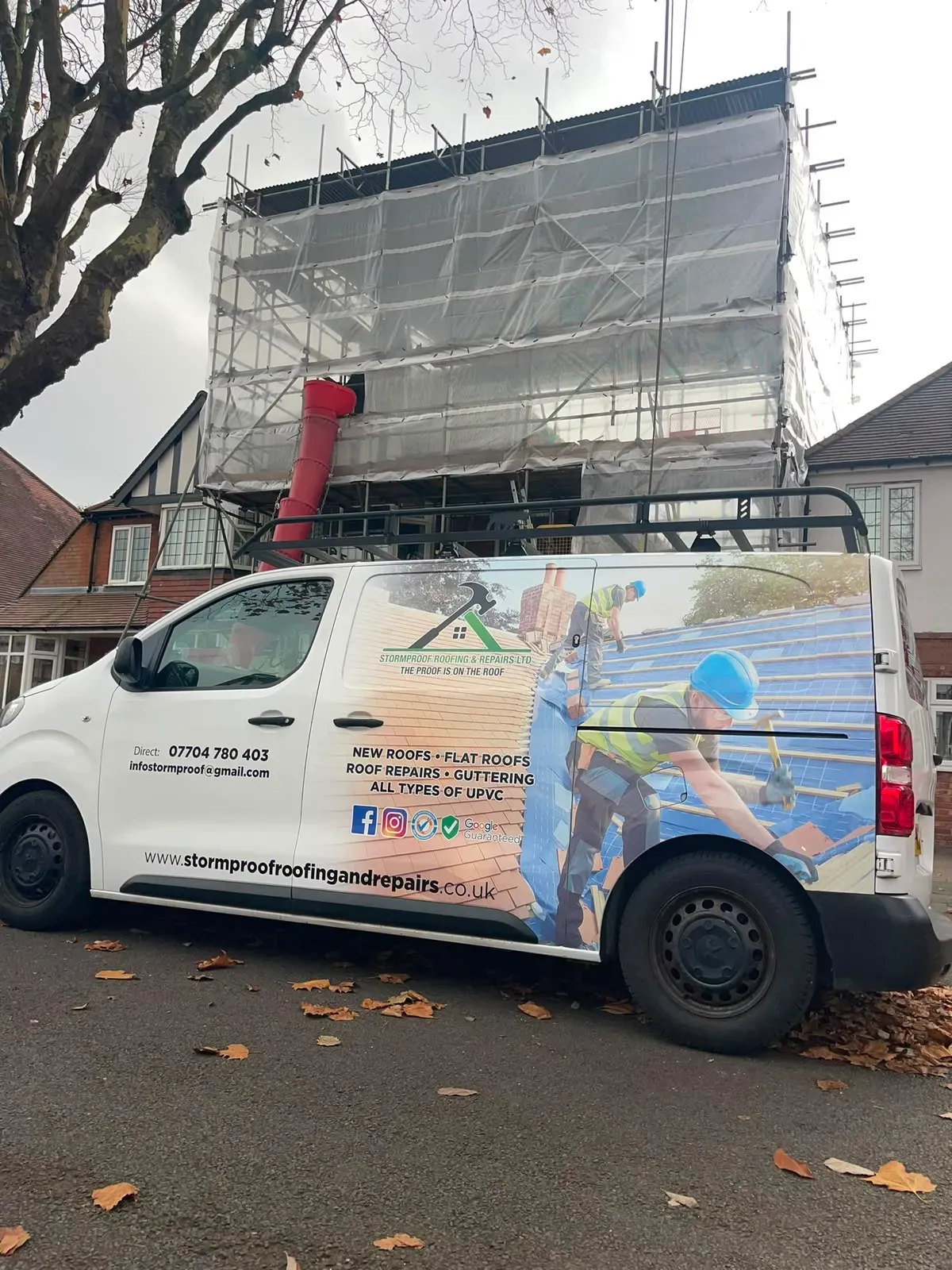 STORMPROOF ROOFING & REPAIRS LTD work van on site for a new roof installation project with scaffolding