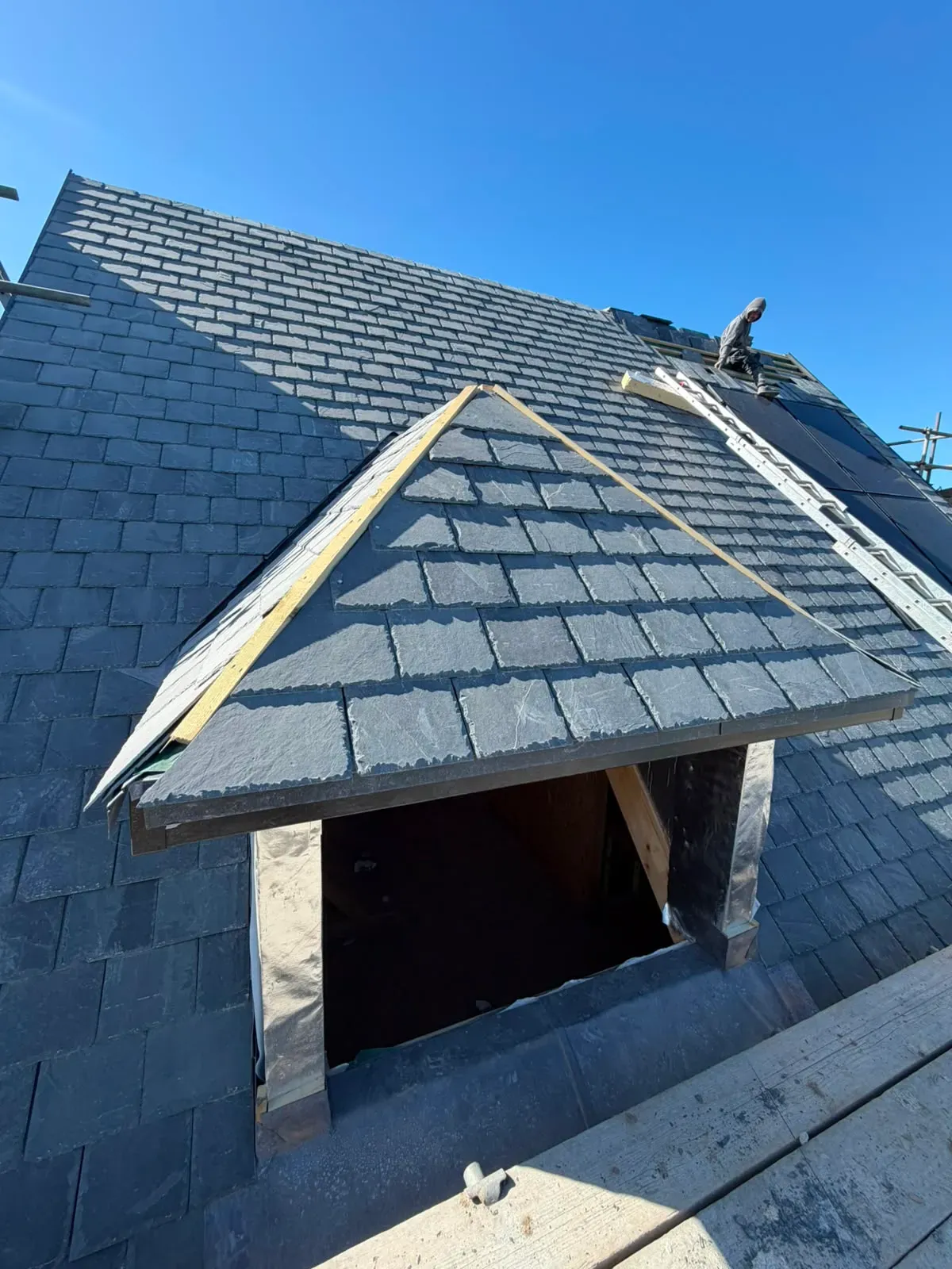 Pitched slate roof installation and dormer slating by STORMPROOF ROOFING & REPAIRS LTD