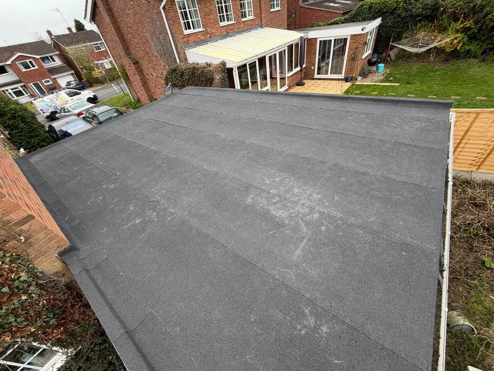 Torch-on mineral felt flat roof installation on a residential extension in Worcester
